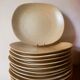 12 free-form speckled satin stoneware plates