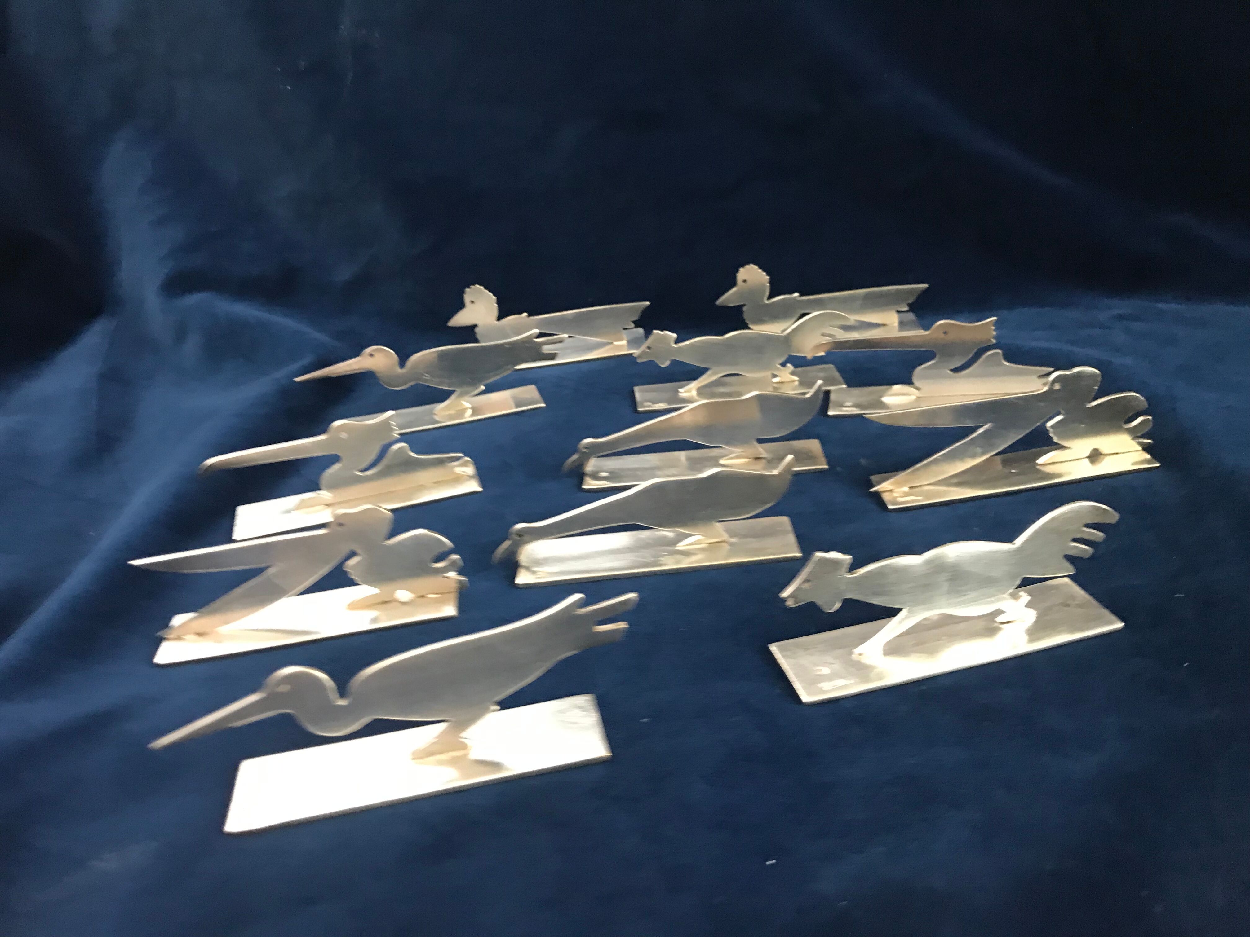 12 knife holders signed Yorel Art Deco