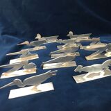 12 knife holders signed Yorel Art Deco