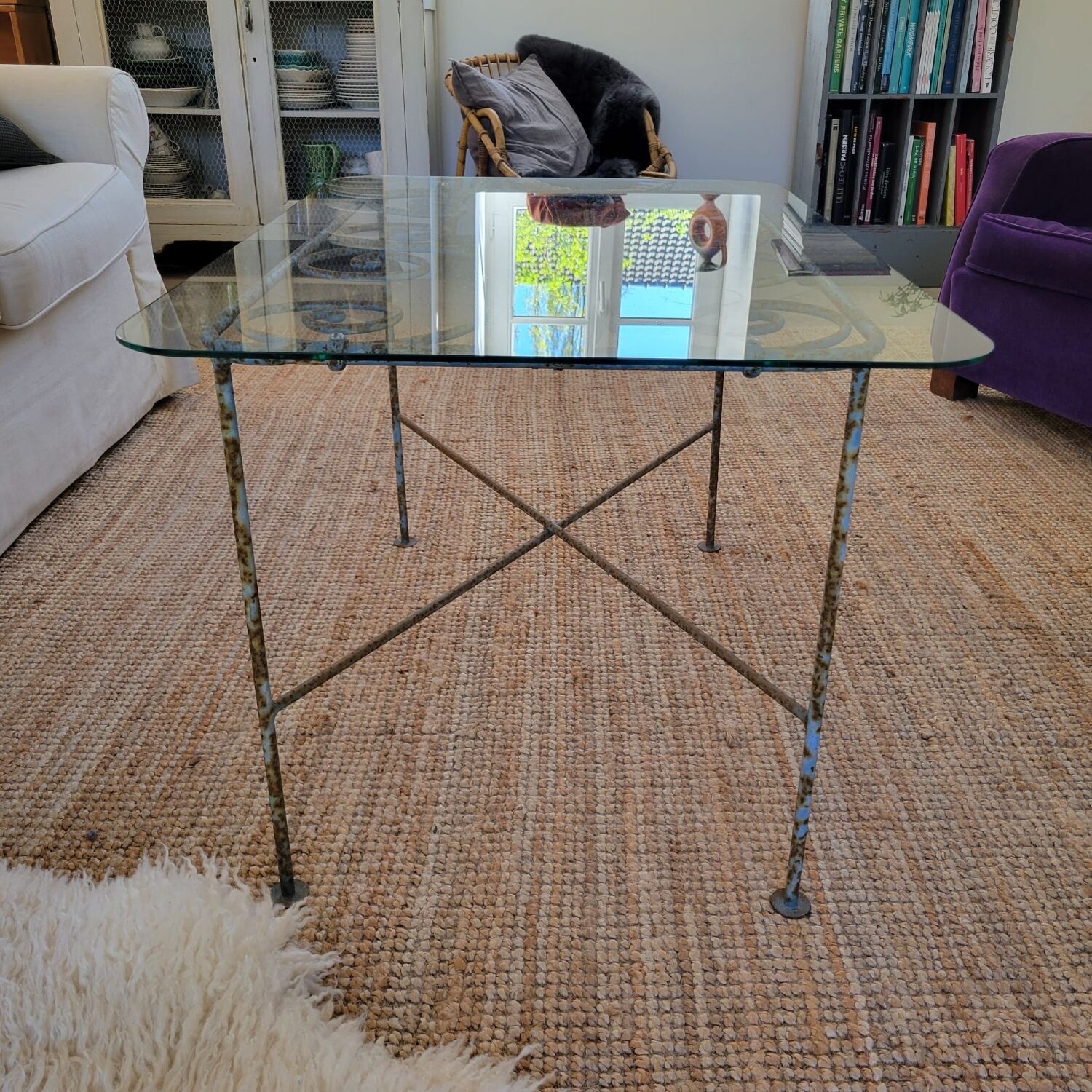 Wrought iron and glass coffee table