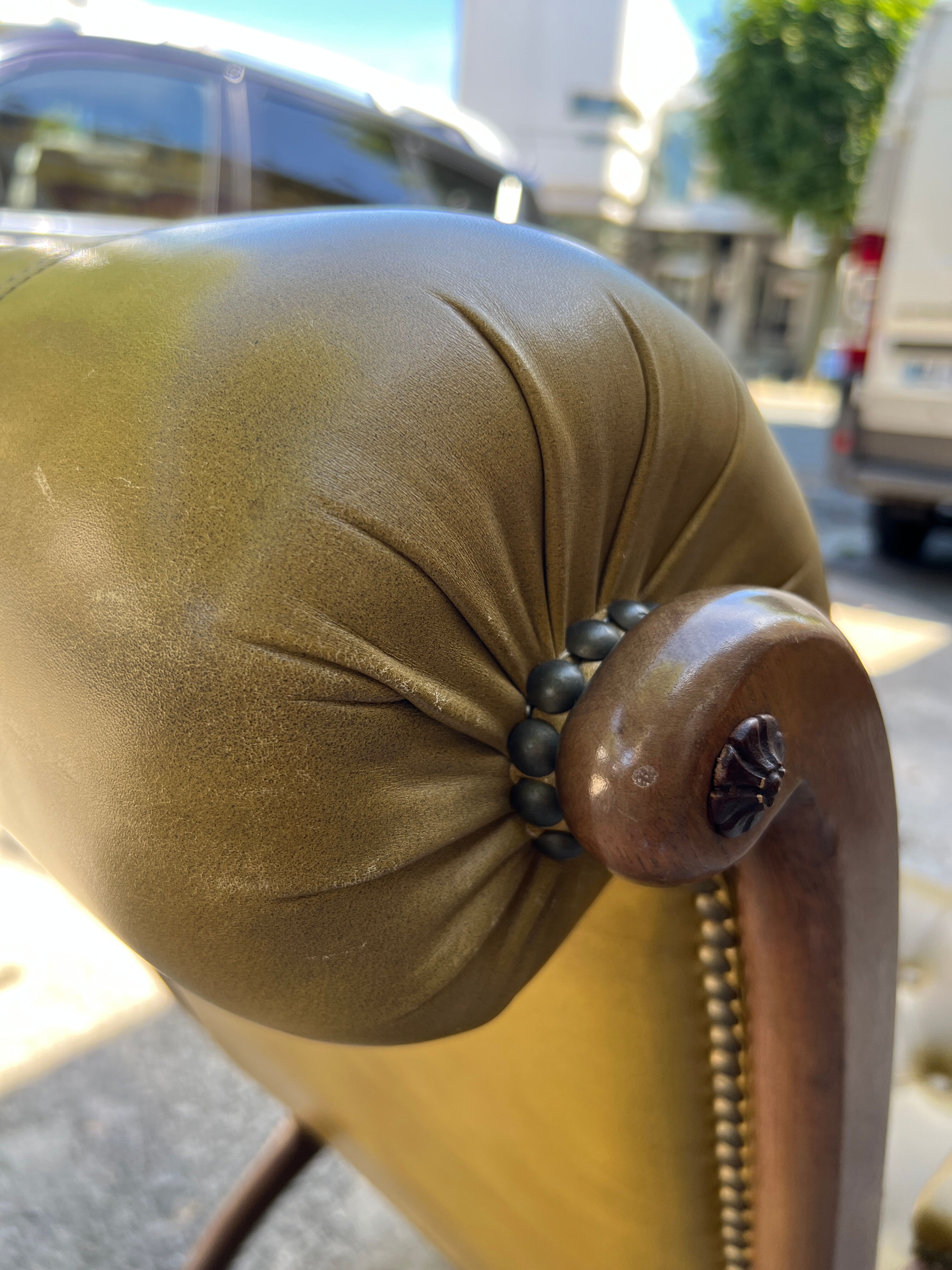 Victoria style green leather chesterfield armchair