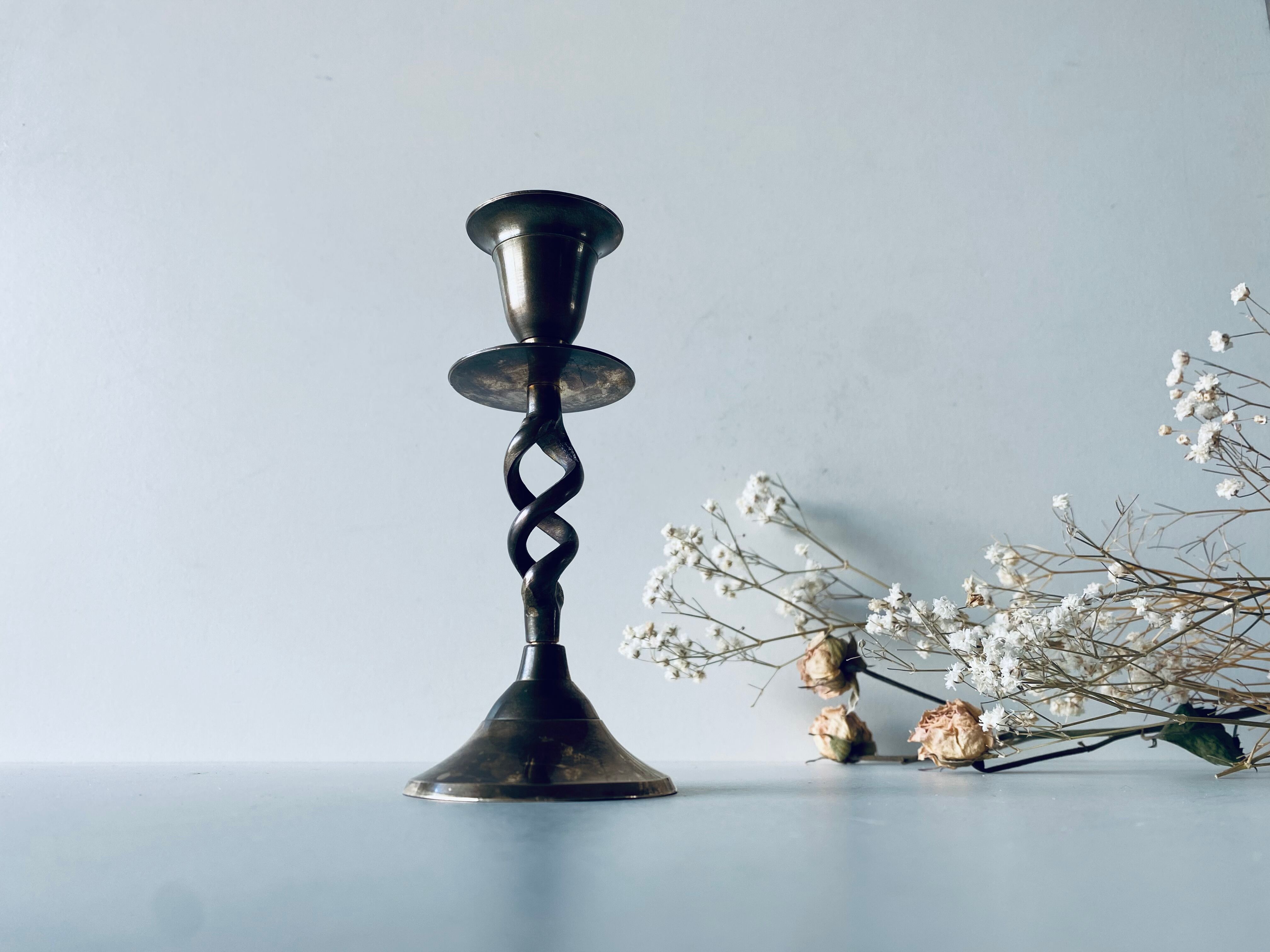 Twisted brass candle holder