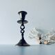 Twisted brass candle holder