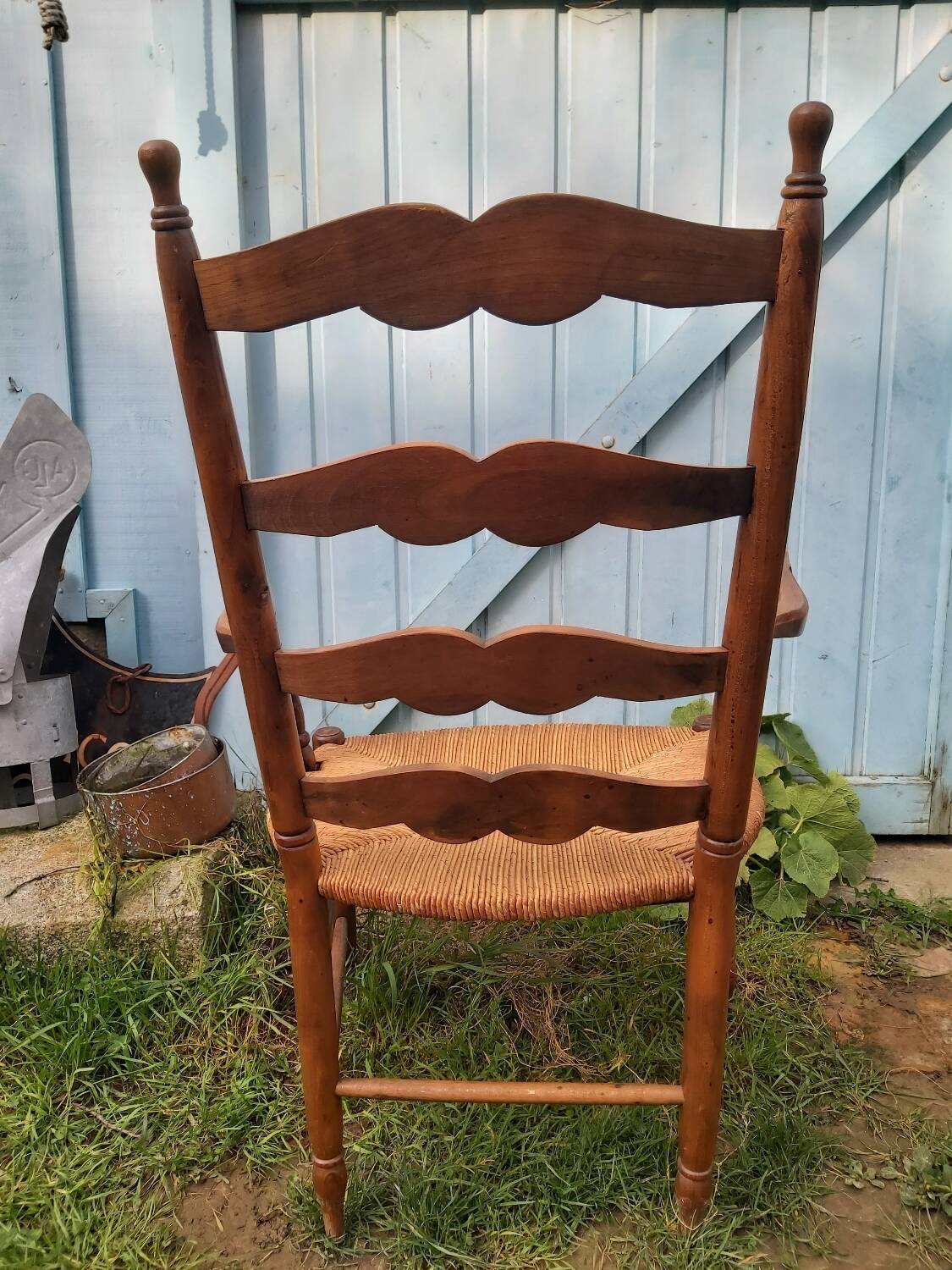 Wooden and straw armchair