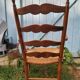 Wooden and straw armchair