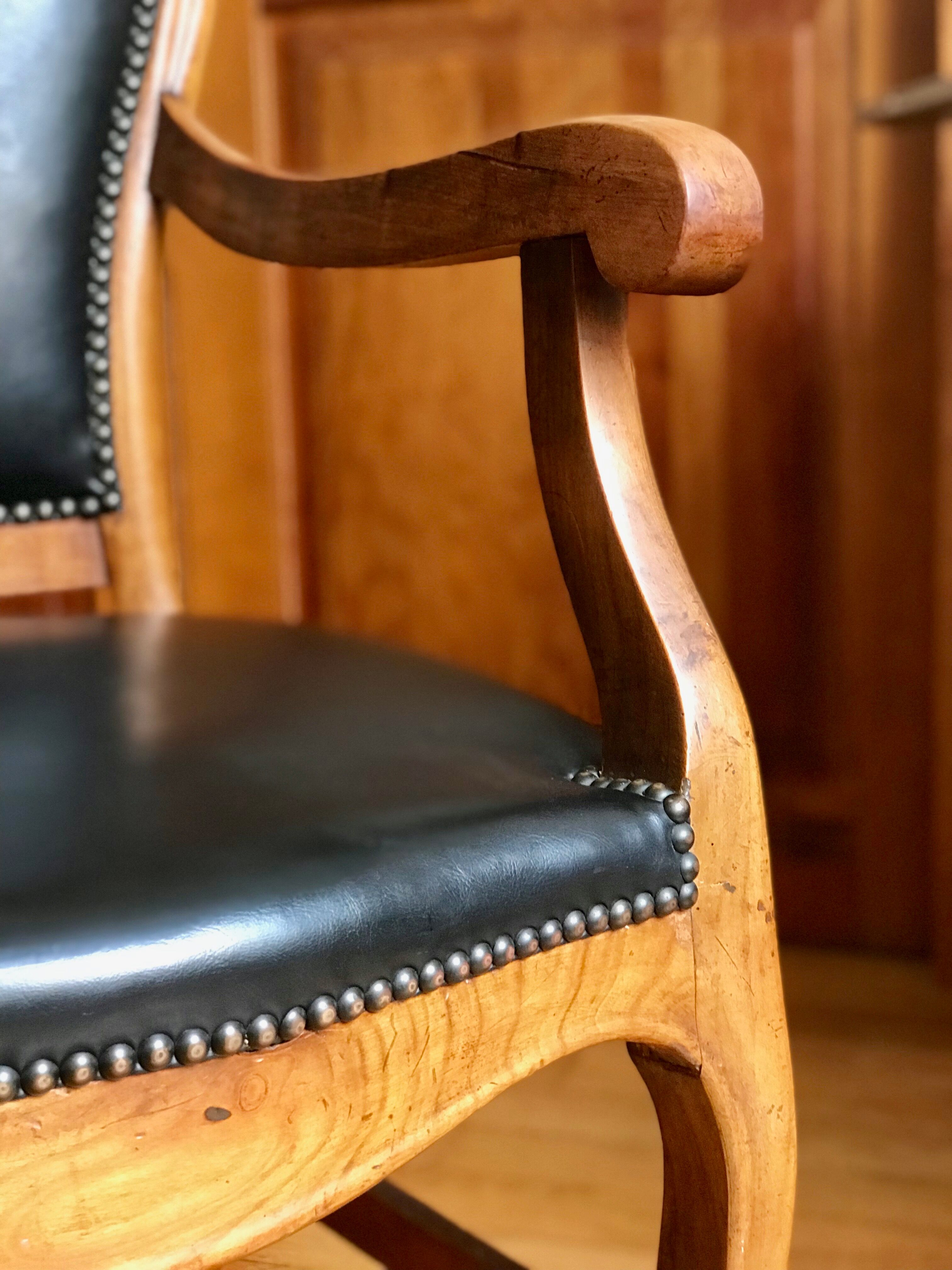 Wood and leather armchair
