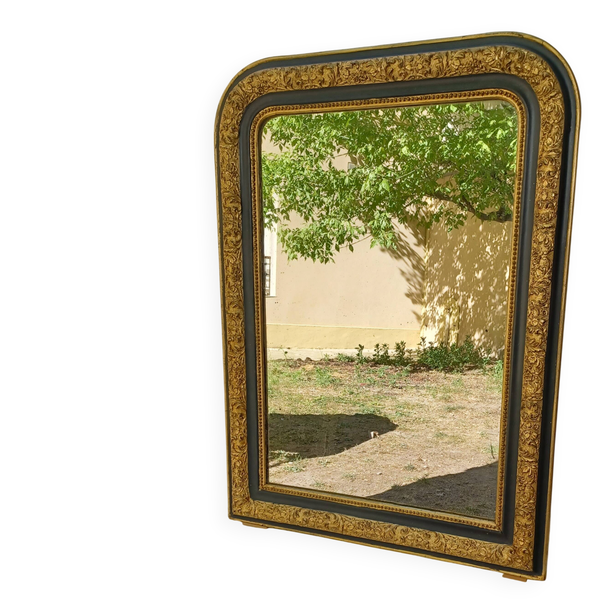 Louis-Philippe mirror, gilded and grey patina, circa 1890.