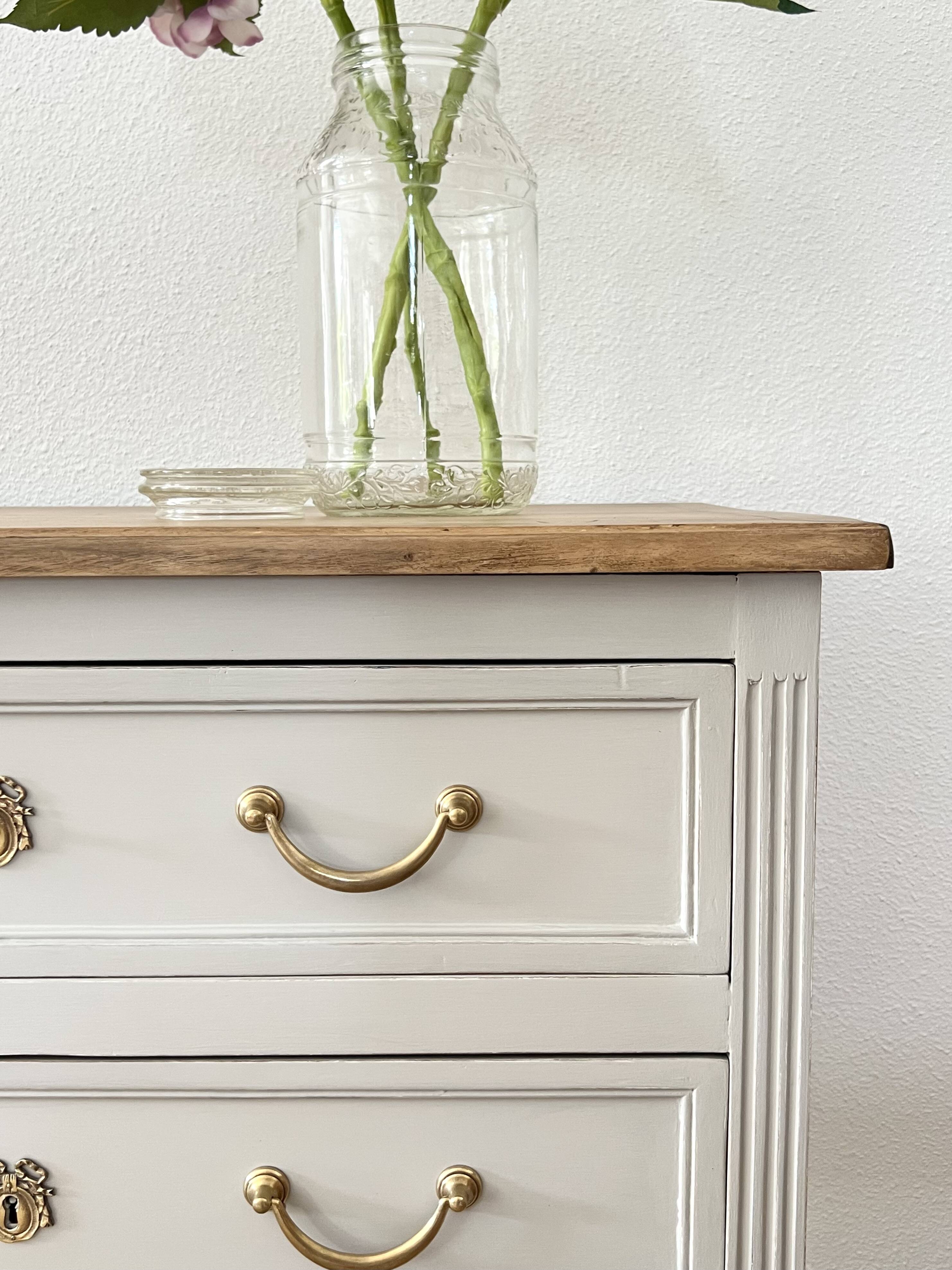 Louis XVI style chest of drawers known as sauteuse