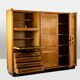 Guillerme and Chambron. Oak wardrobe with integrated secretary. 1970-80.