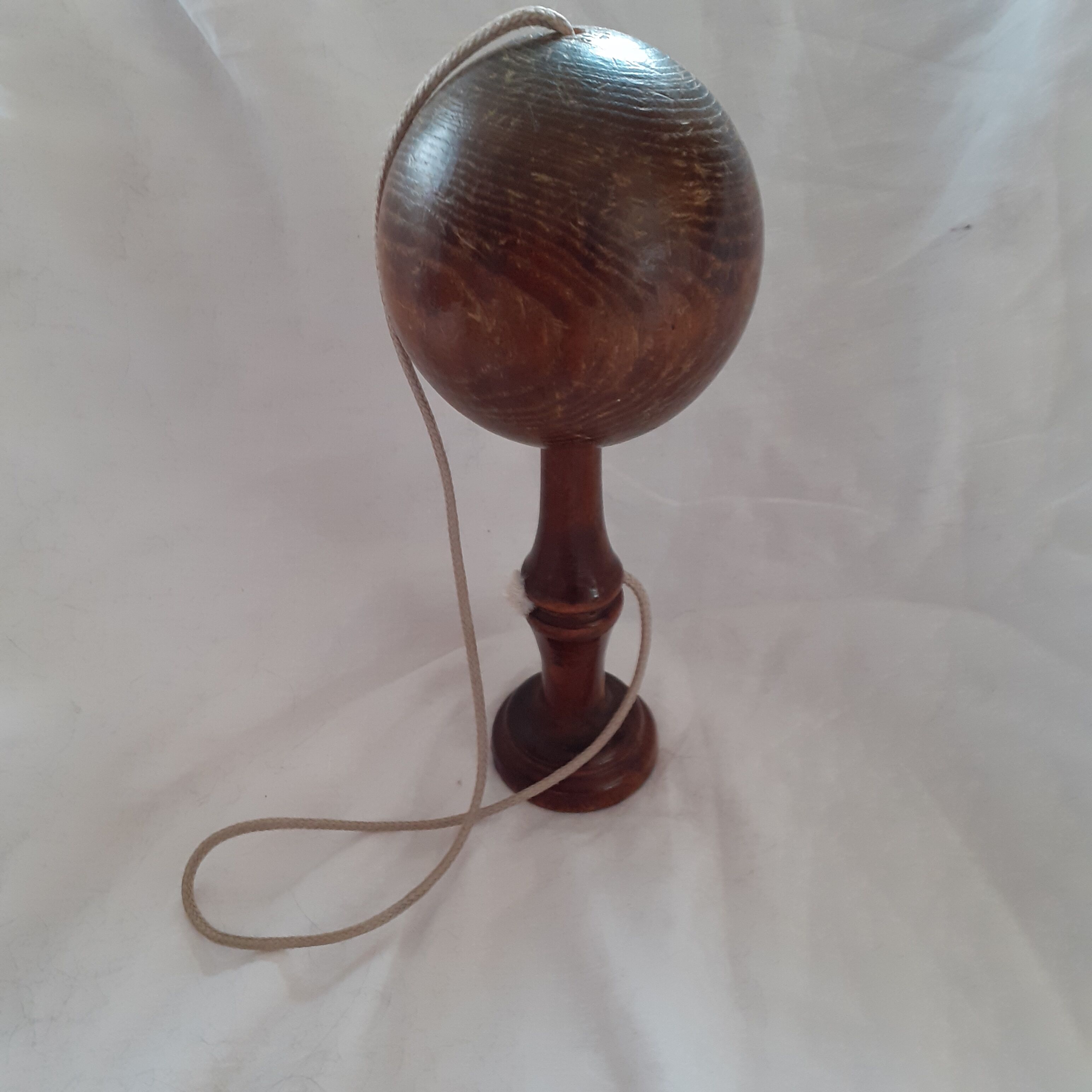 Old wooden bilboquet