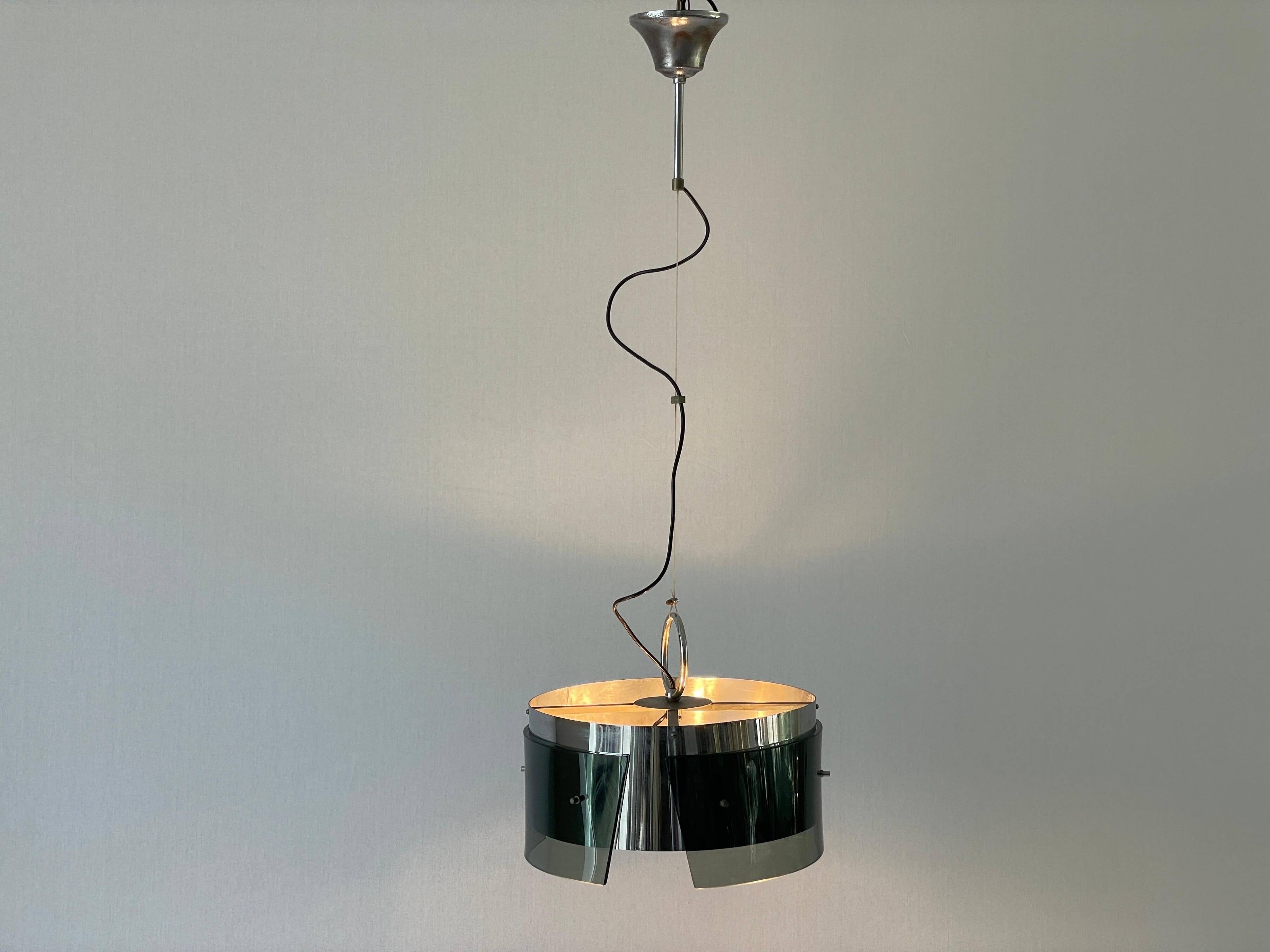 Suspended lamp in green glass and chrome, 1960s, Italy