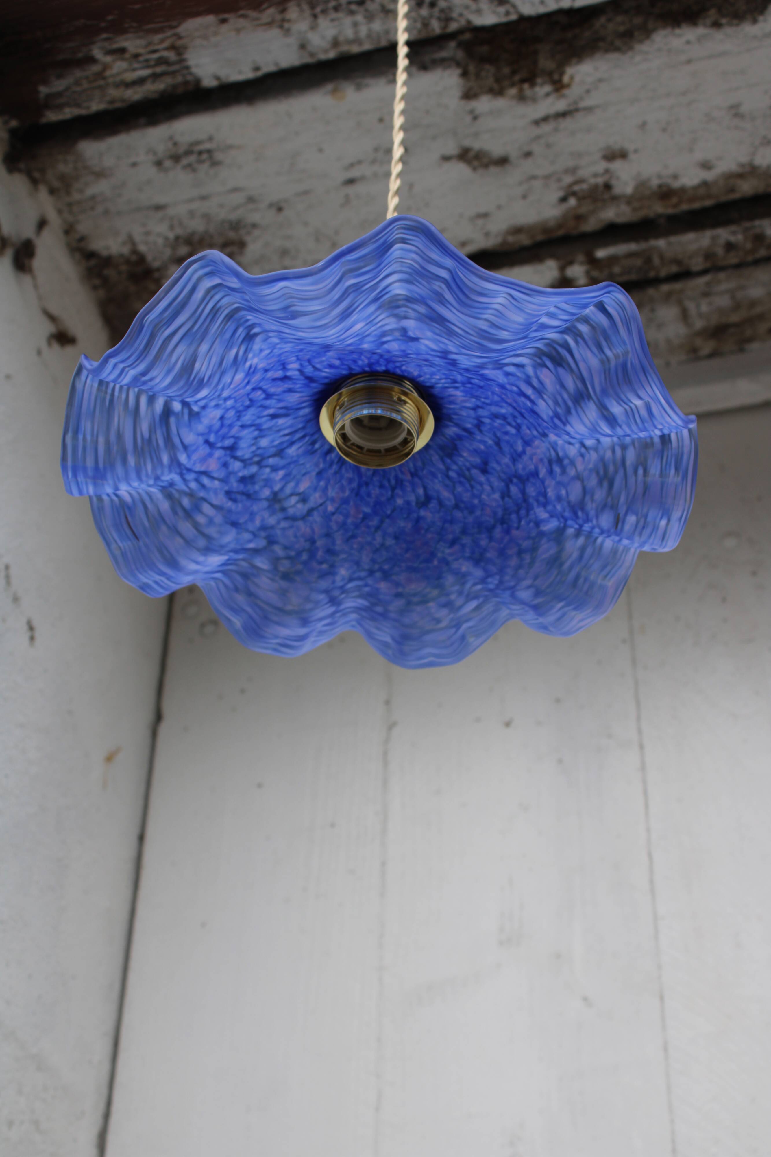 Hanging in blue glass paste