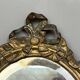 Pair of mirror sconces with bronze candlesticks from the 19th century.