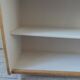 Vintage library in oak veneer, pearl grey interior, metal legs.