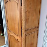 Louis XV rustic bonnetière in solid cherry wood, late 19th to early 20th century.