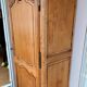 Louis XV rustic bonnetière in solid cherry wood, late 19th to early 20th century.