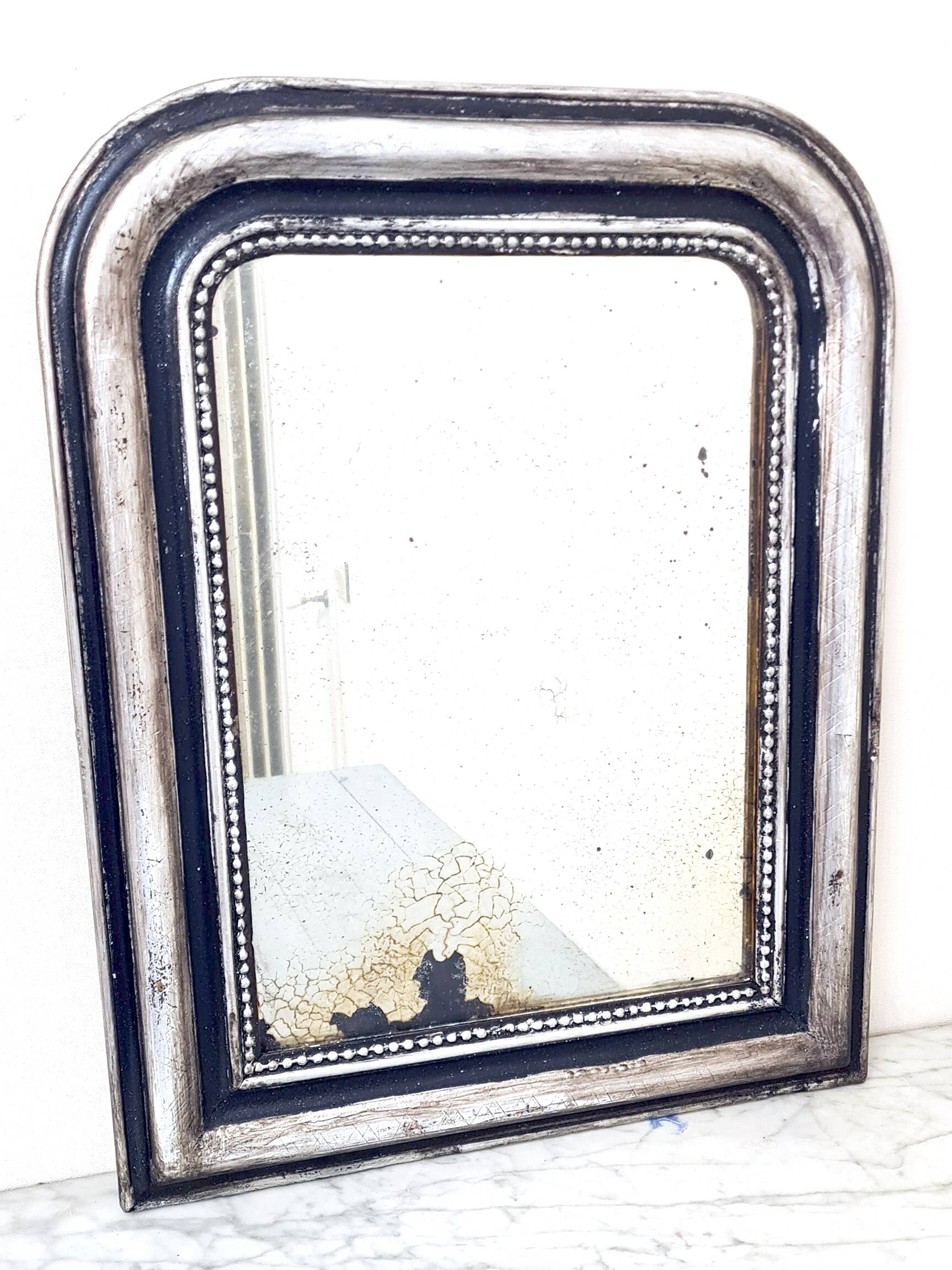 Old Louis Phillipe mirror, silvered with silver leaf.
