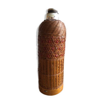 Old vintage wicker thermos