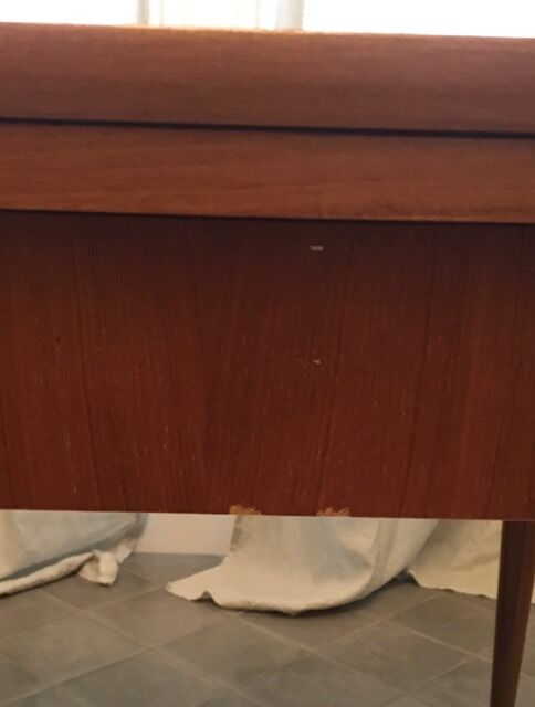 Danish dining table with built-in extension cords