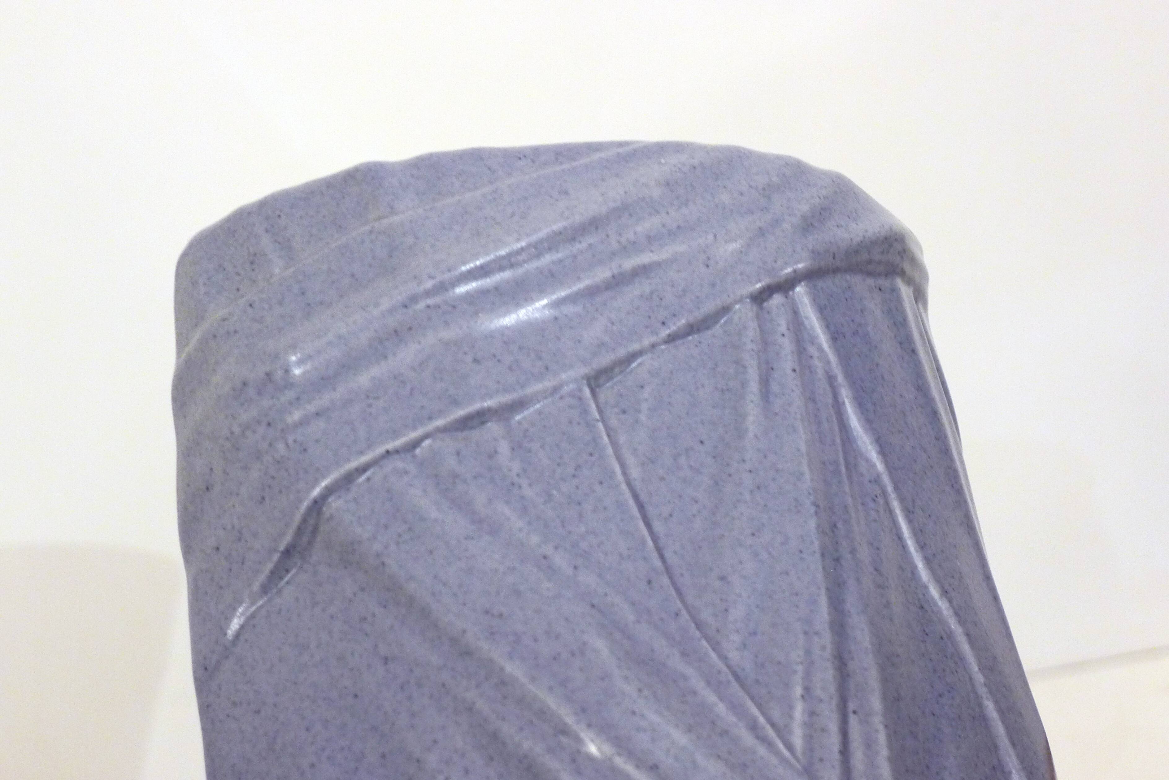 Purple vase, draped ribbons in relief