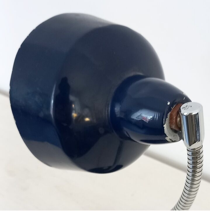 Flexible bedside lamp in blue lacquered sheet metal and stainless steel, edition of the 70s.
