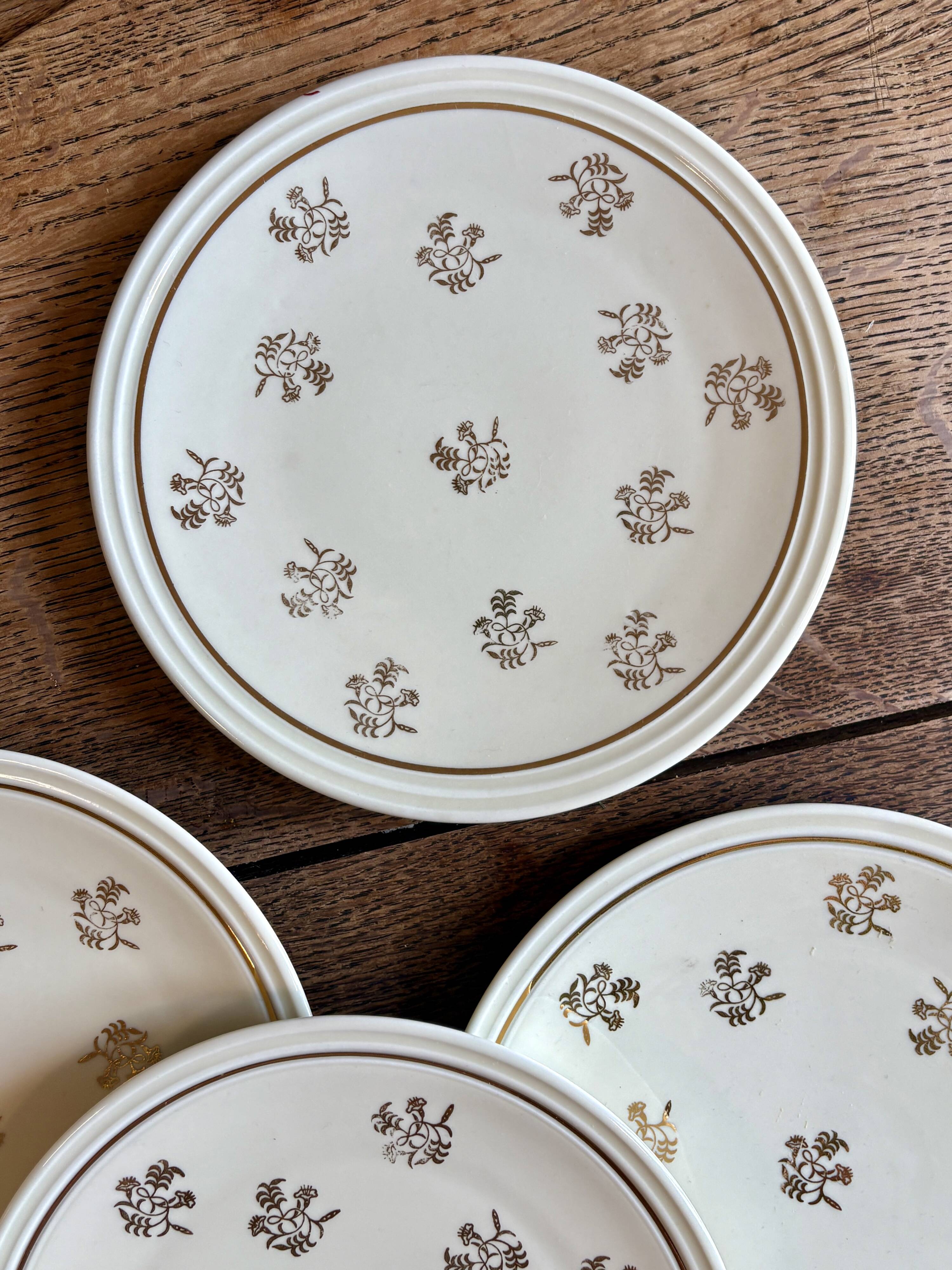 Lot de 11 assiettes à dessert anciennes en porcelaine de Limoges
