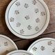Lot de 11 assiettes à dessert anciennes en porcelaine de Limoges