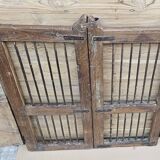 Old gate in Burmese teak and wrought iron