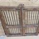 Old gate in Burmese teak and wrought iron