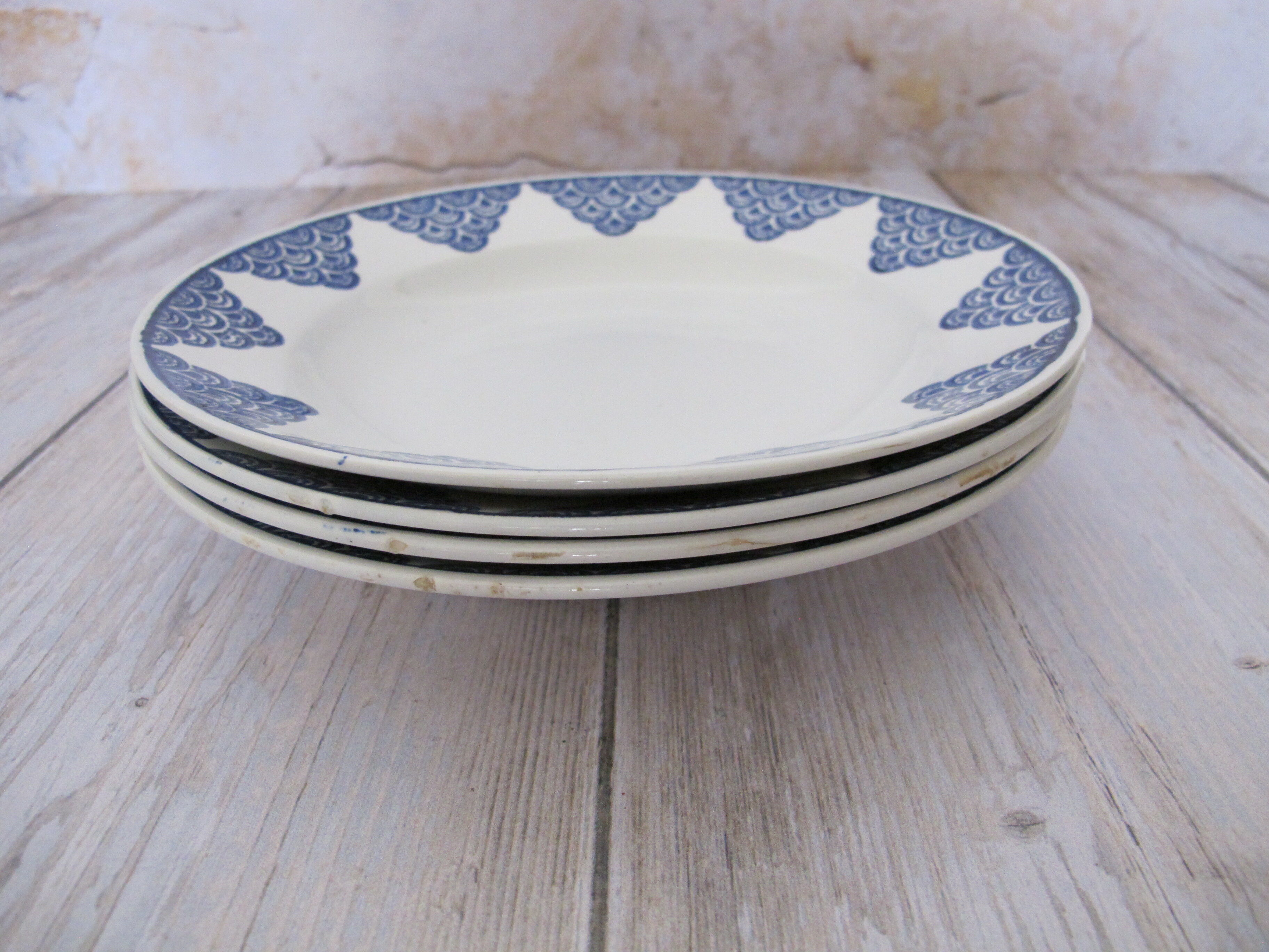 4 plates made of Saint Amand earthenware