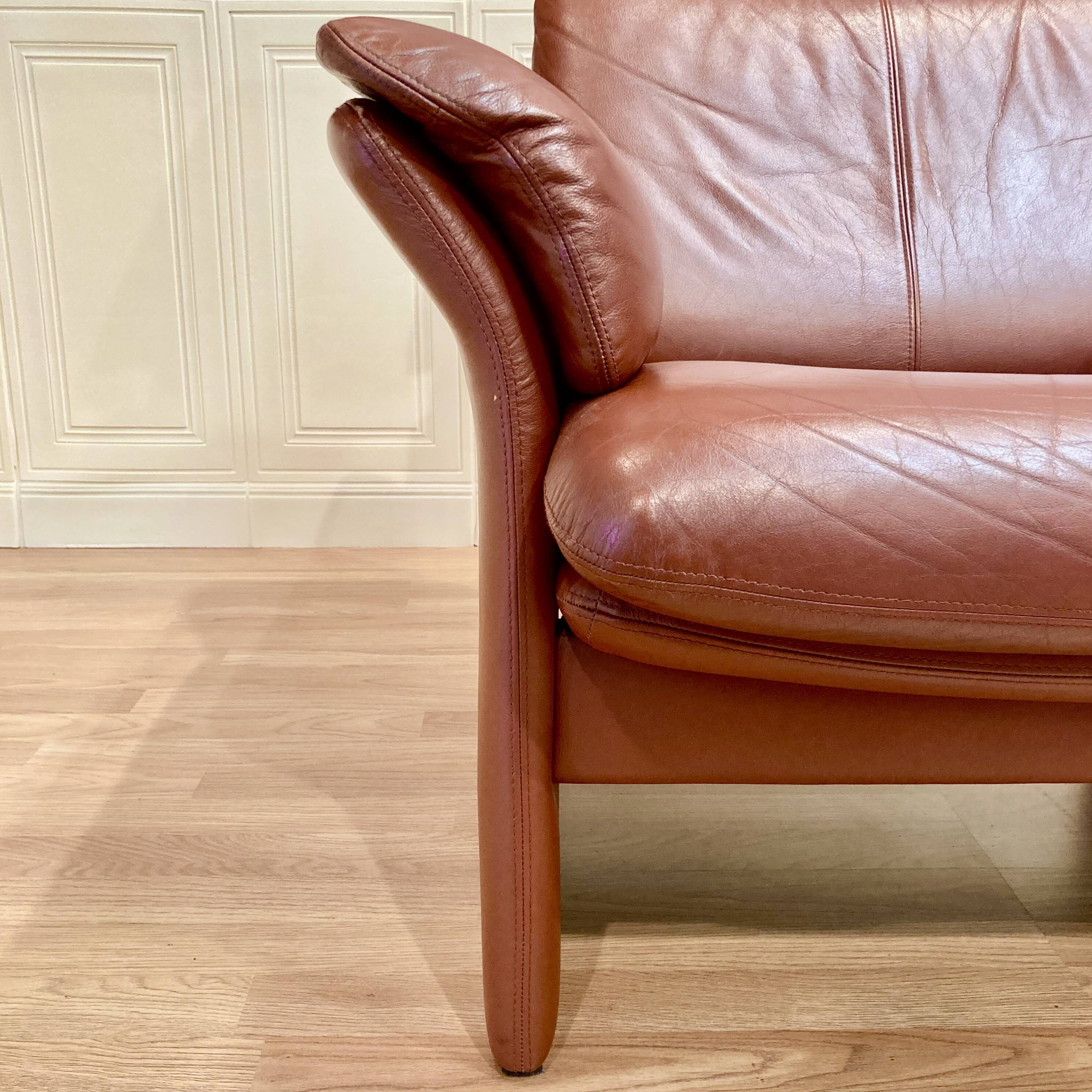 Pair of "Erpo" designer adjustable leather armchairs.