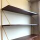 Scandinavian wall-mounted bookcase with floating rosewood shelves, period