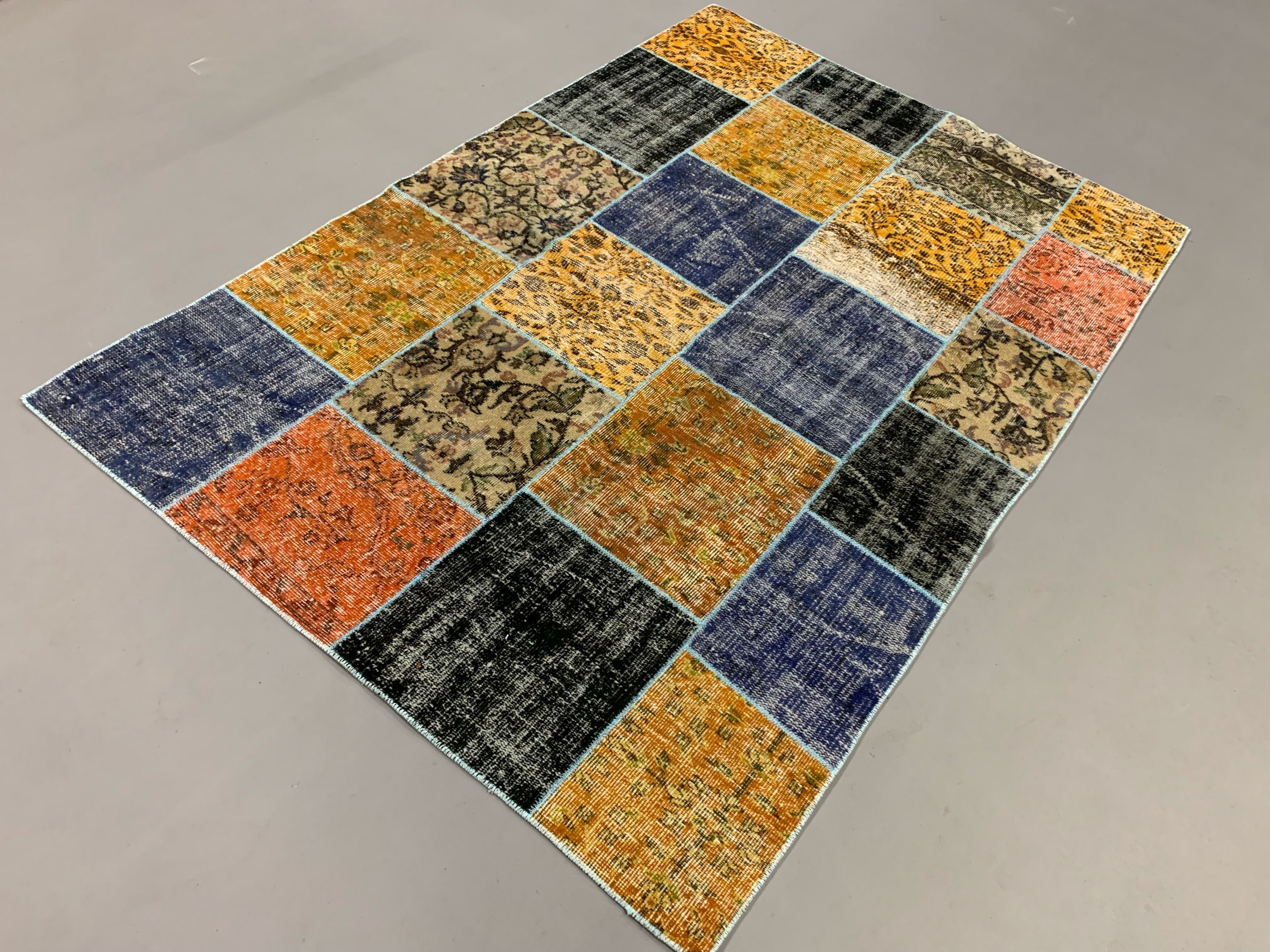 Distressed vintage turkish patchwork rug 218x150 cm wool medium