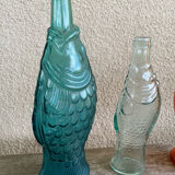 3 glass bottle fish