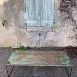 Pair of green teak coffee tables.