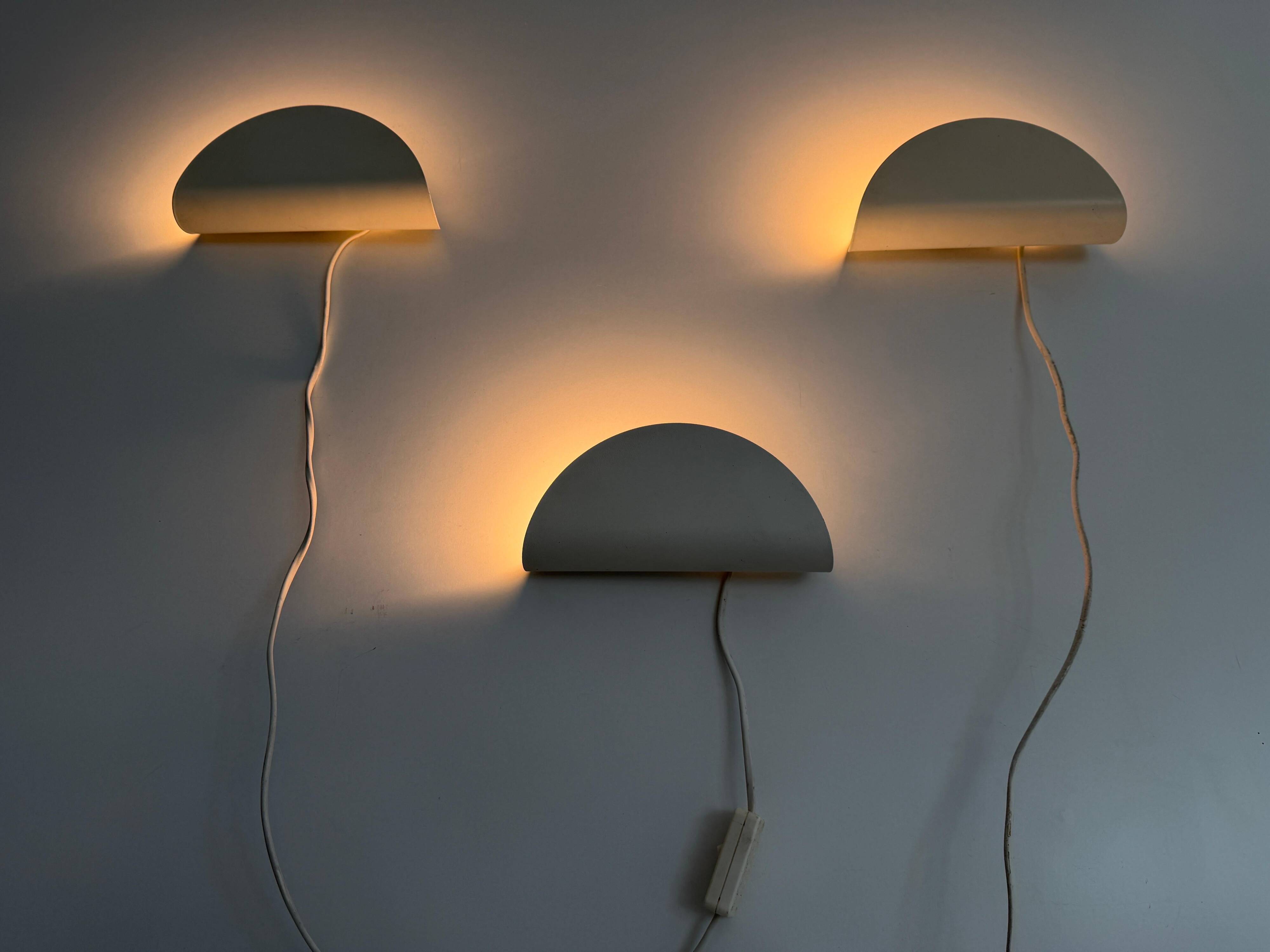 Set of three cream metal wall lights by Nordlux, 1980s, Sweden.