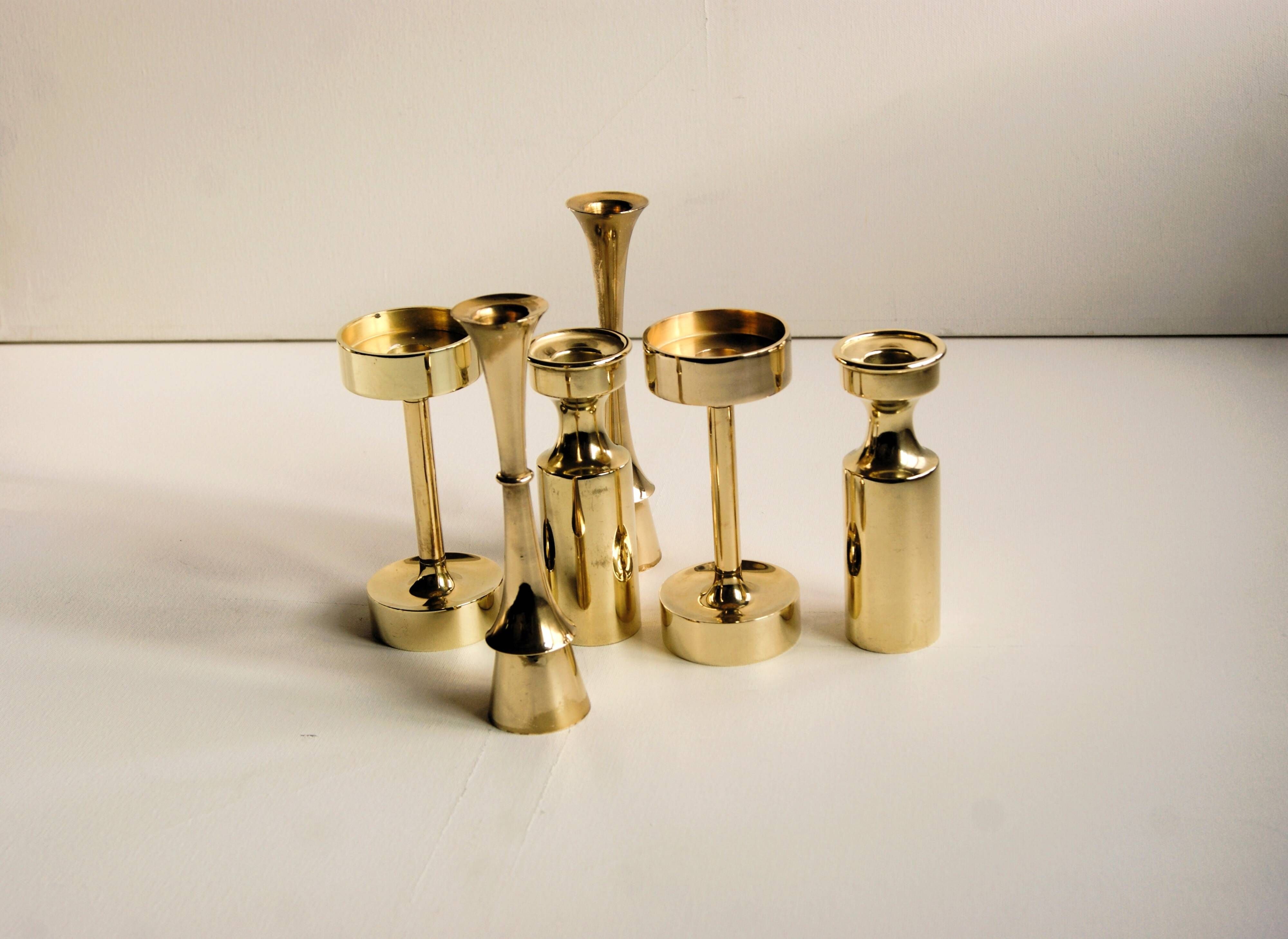 A set of six brass candle holder in mid-century modern design - Denmark 1970s.
