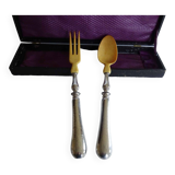 Silver and horn salad servers