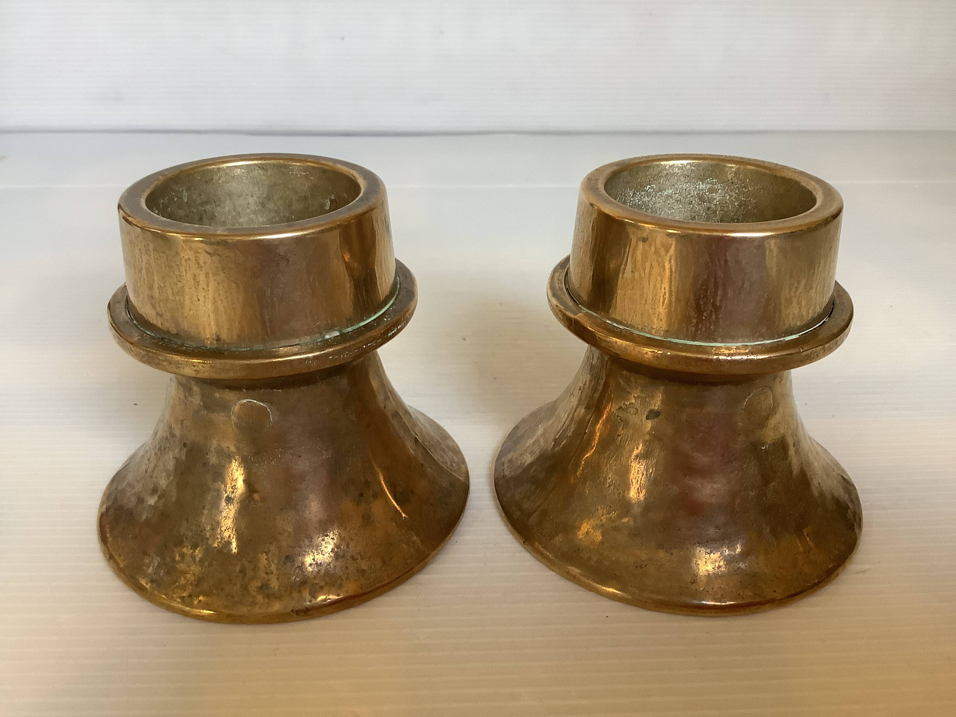 Pair of bronze candlesticks with tulip base