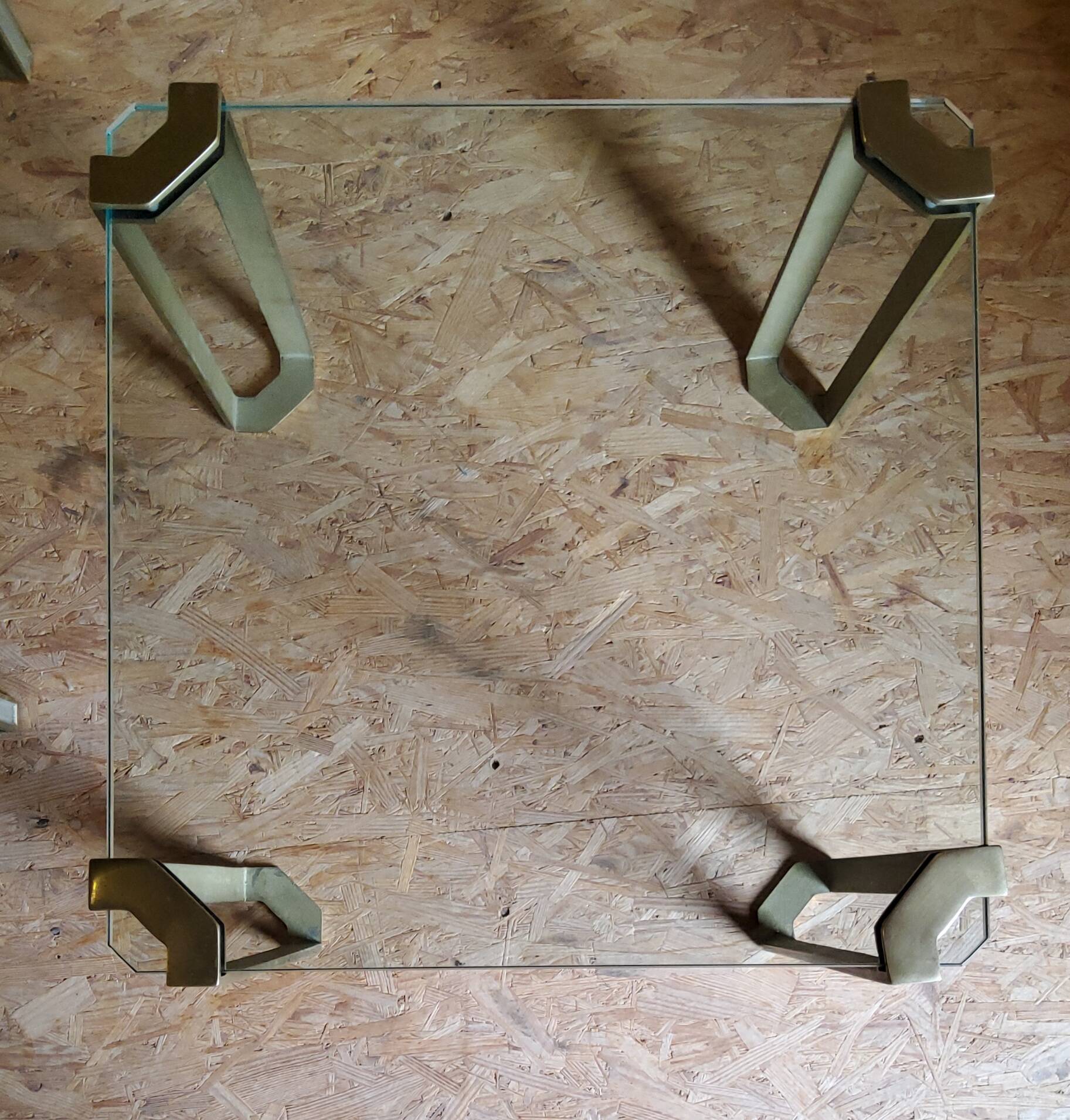 Glass and brass coffee tables by Peter Ghyczy