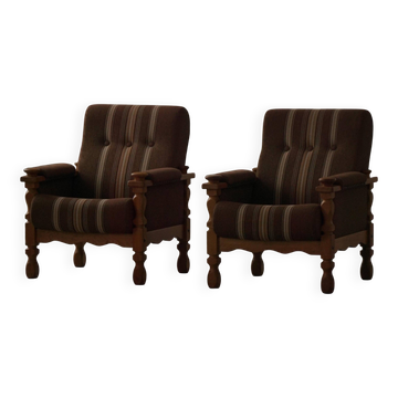 Modern Danish, a pair of lounge chairs in oak and wool, Henning Kjærnulf, 1960s.