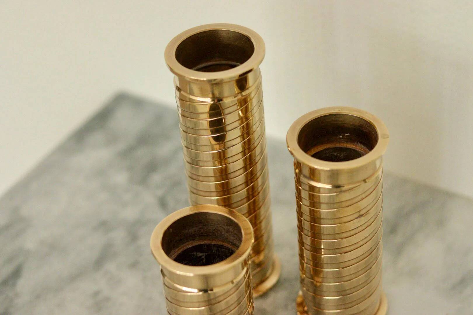 Mid-century Swedish brass candlestick trio