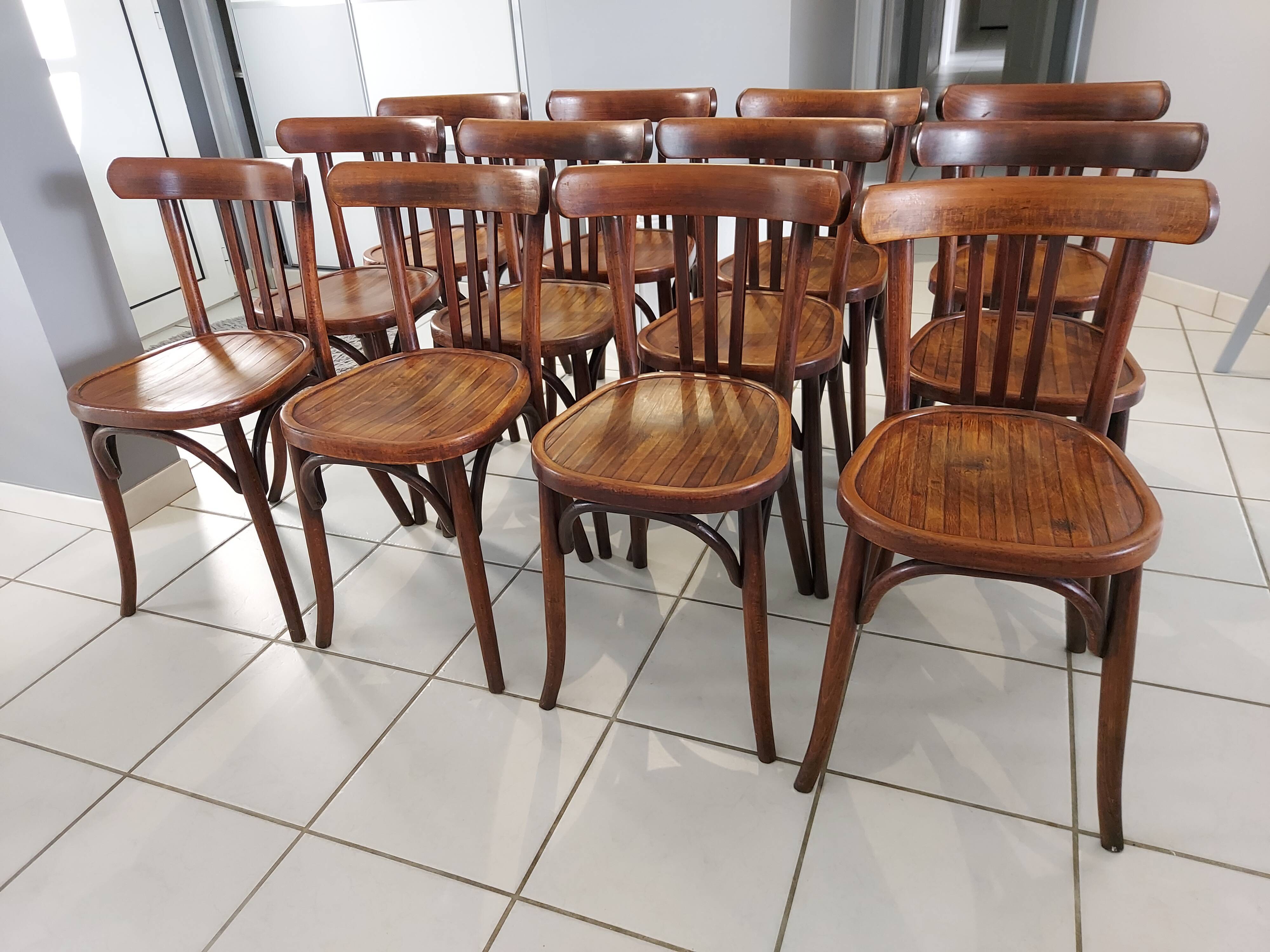 Suite of 12 chairs of bistrot Baumann 1940s