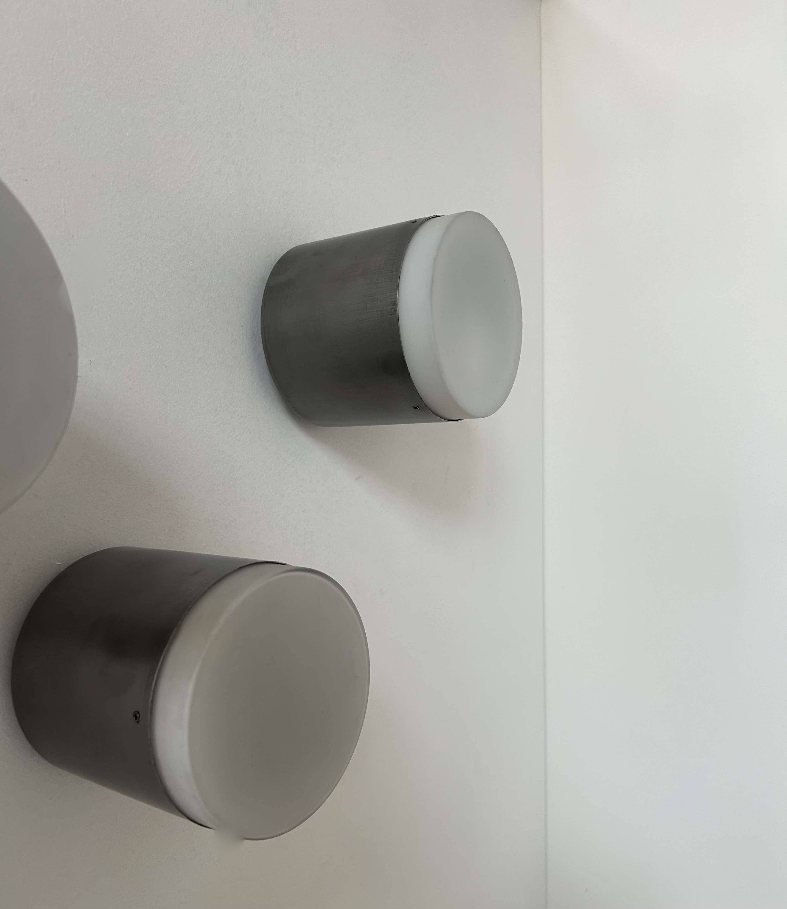 Set of 3 vintage Raak wall lights, aluminum and opaline, Holland 1960