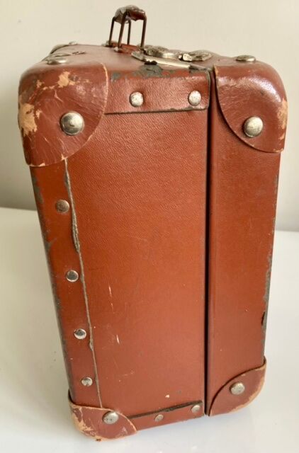 Small old brown suitcase