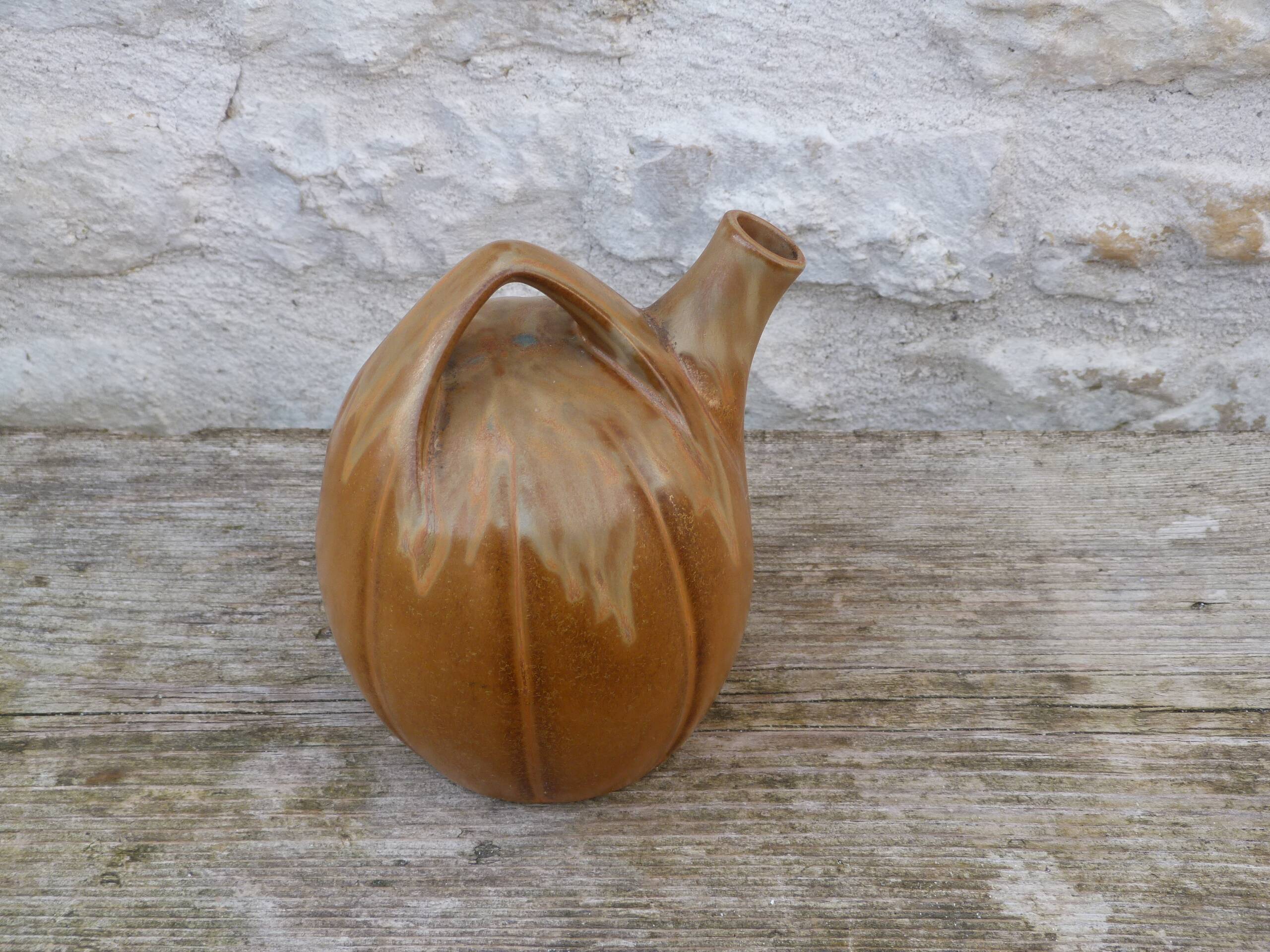 Vintage brown flamed stoneware jug signed Denbac.