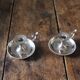 Pair of silver metal cave rat