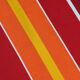 Vintage deck chair with red and orange striped fabric, original patina.