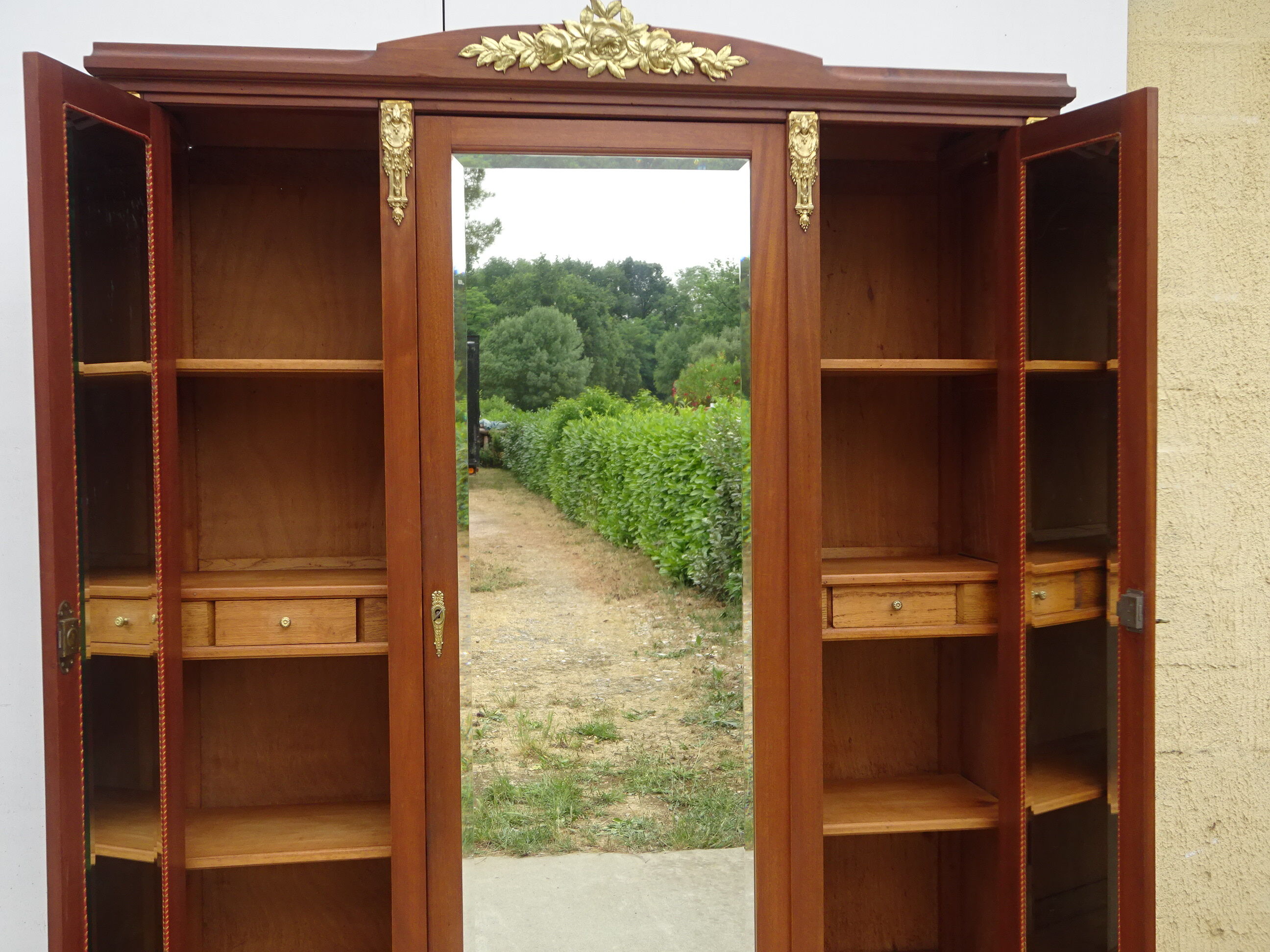 Louis XVI style wardrobe late nineteenth century, mahogany and marquetry