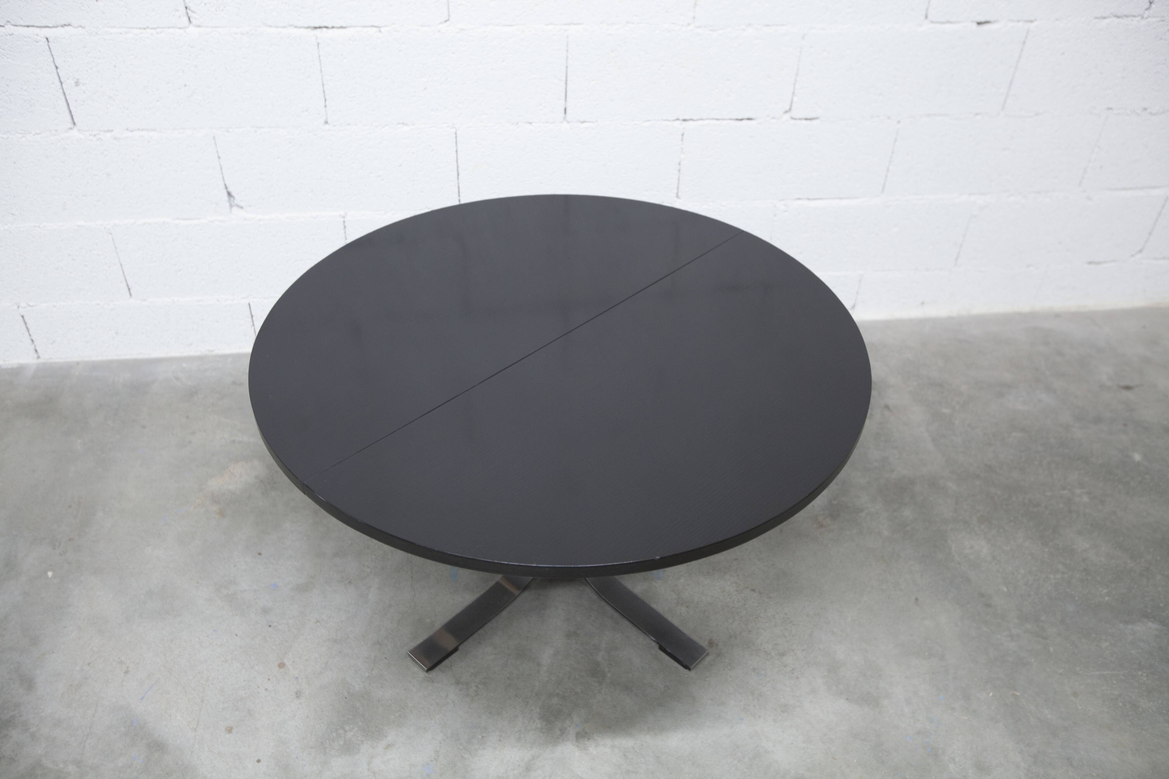 Round table rises and lowers Osvaldo Borsani black and chrome with extension